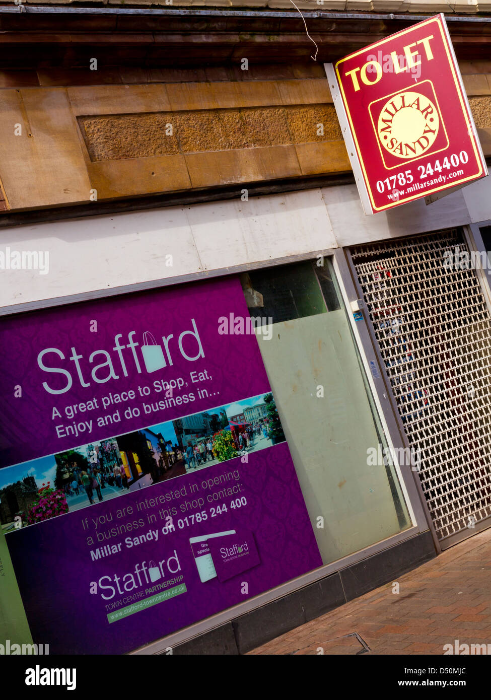 Closed high street shop with To Let sign in Stafford town centre Staffordshire England UK during 2013 economic downturn Stock Photo