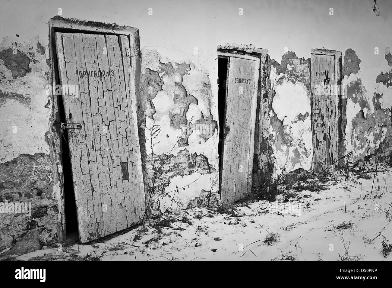 old locked doors on abandoned factory Stock Photo