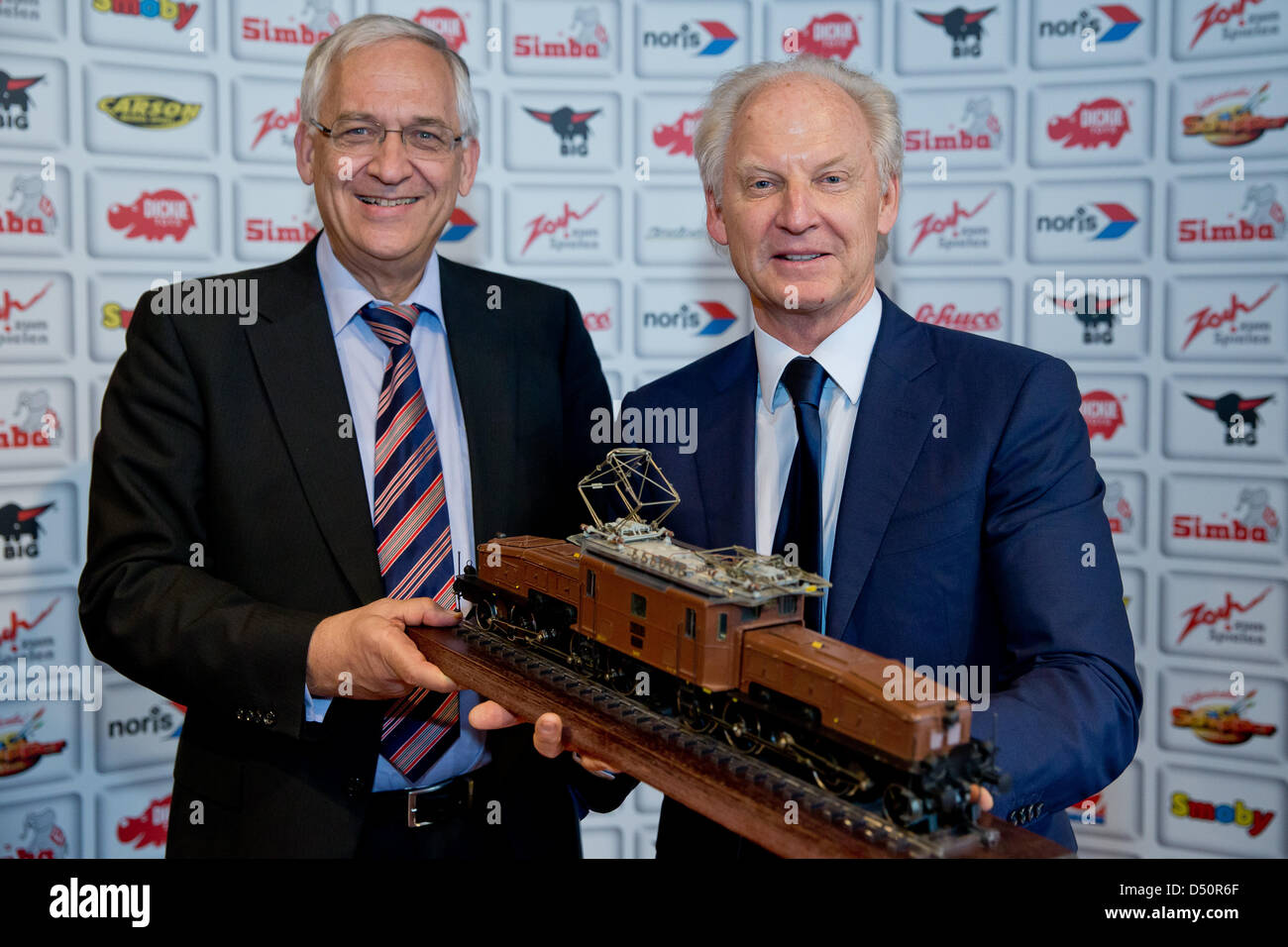 CEO of the Simba Dickie Group Michael Sieber (R) poses with Maerklin's  liquidator Michael Pluta as part of the press conference about the take  over of the model train company Maerklin at