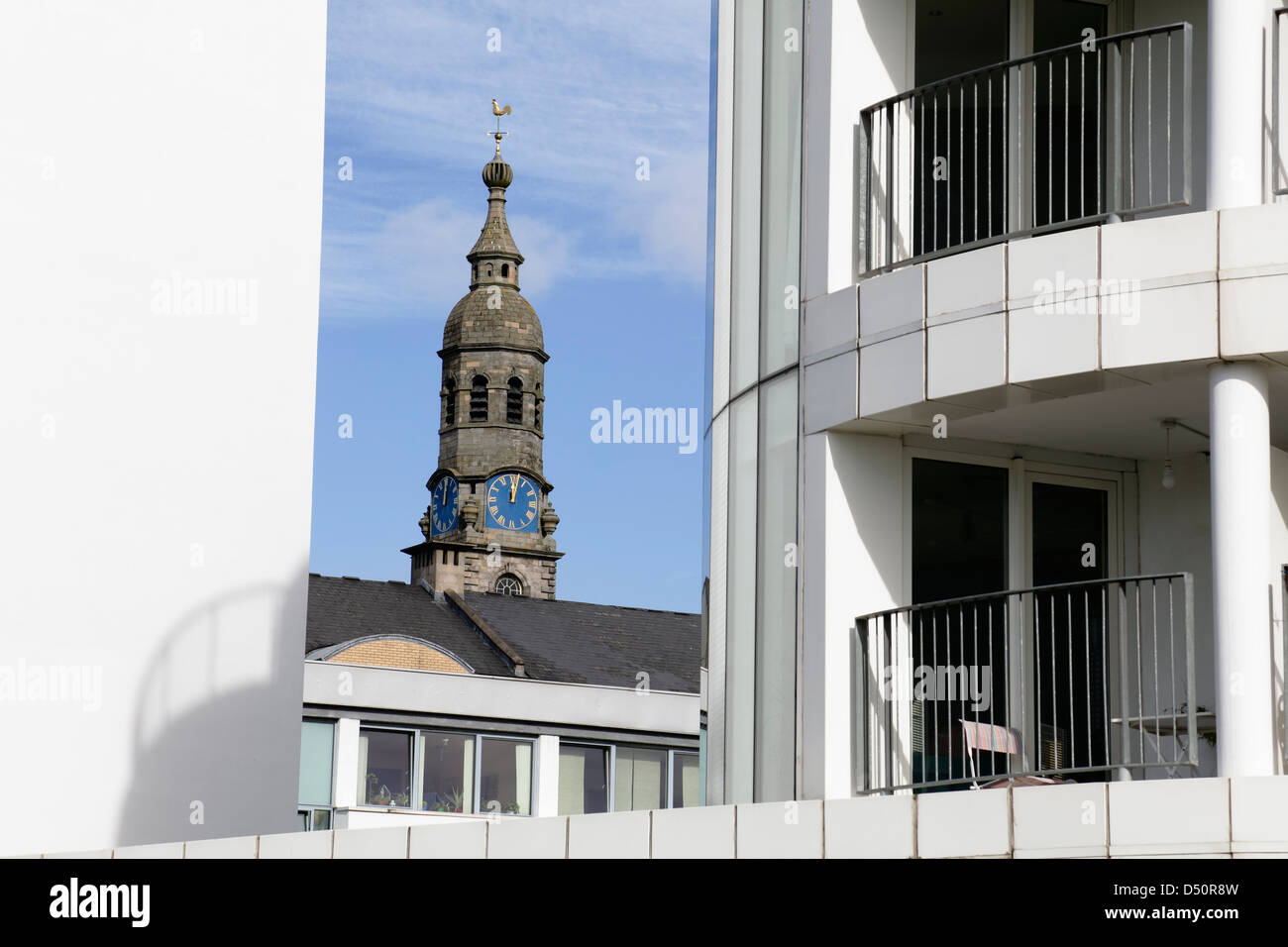 The clock steeple of St Andrew's in the Square Church viewed between modern  buildings in Glasgow, Scotland, UK Stock Photo