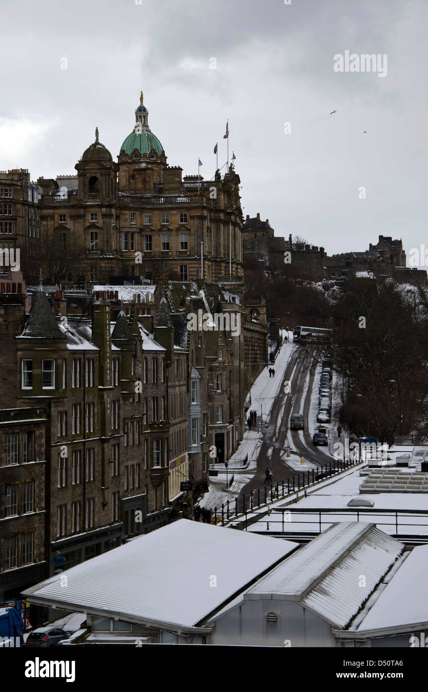 Edinburgh in the snow: looking over the roof of the snow-covered Waverley Station towards the Castle. Stock Photo