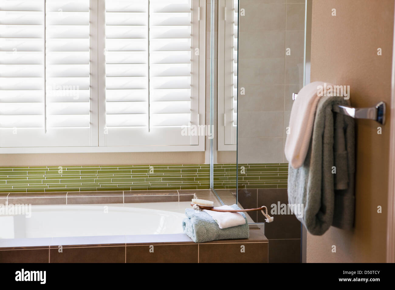 Windows above bathtub in traditional bathroom;Tustin;California;USA