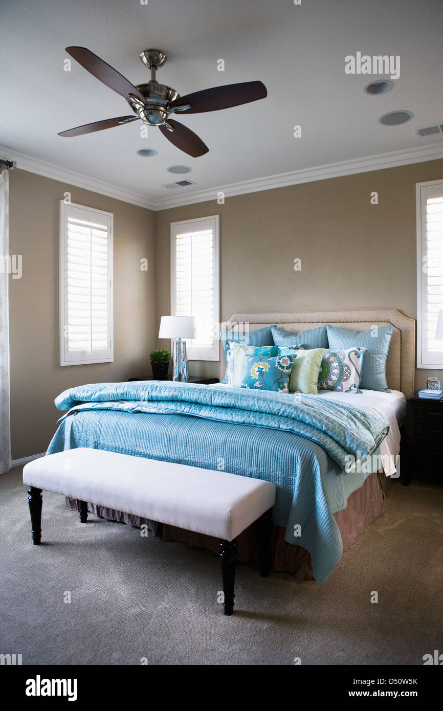 Throw pillows on bed in bedroom, Tustin, California, USA Stock Photo