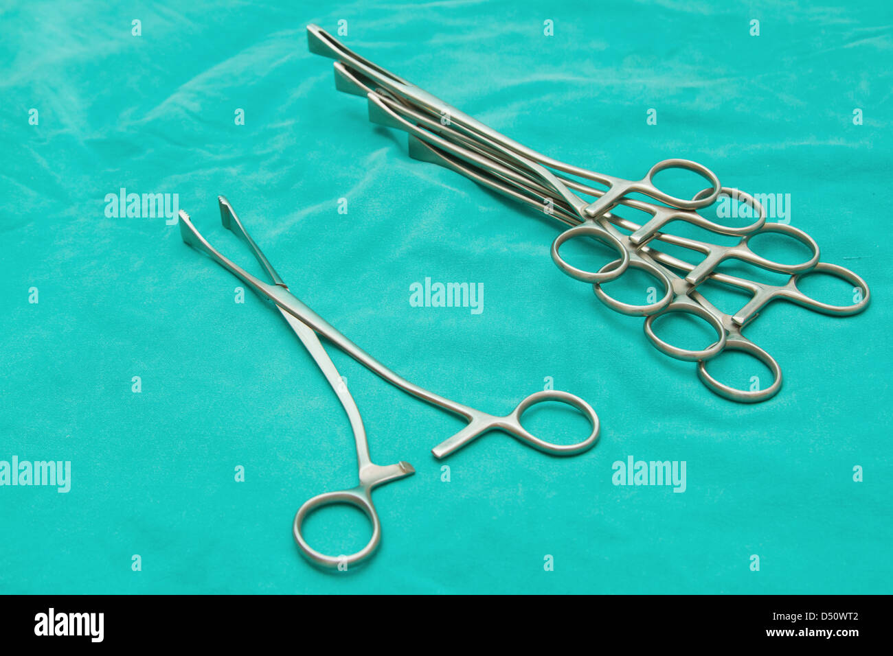 Surgical instruments on sterile table Stock Photo