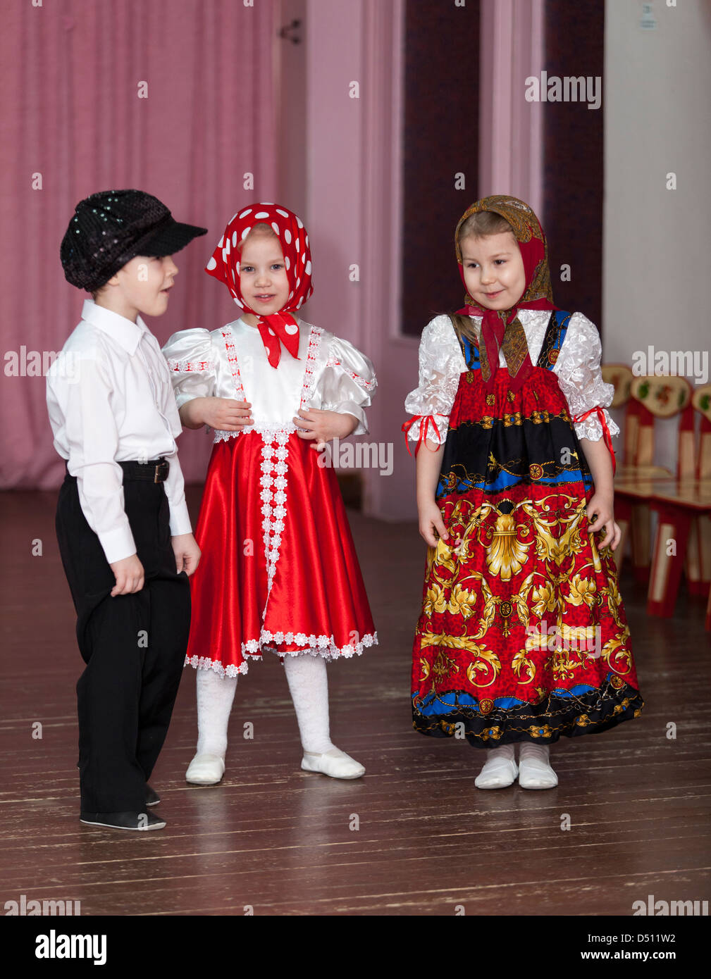 Cute boys and girls in Russian traditional clothes in kindergarten ...