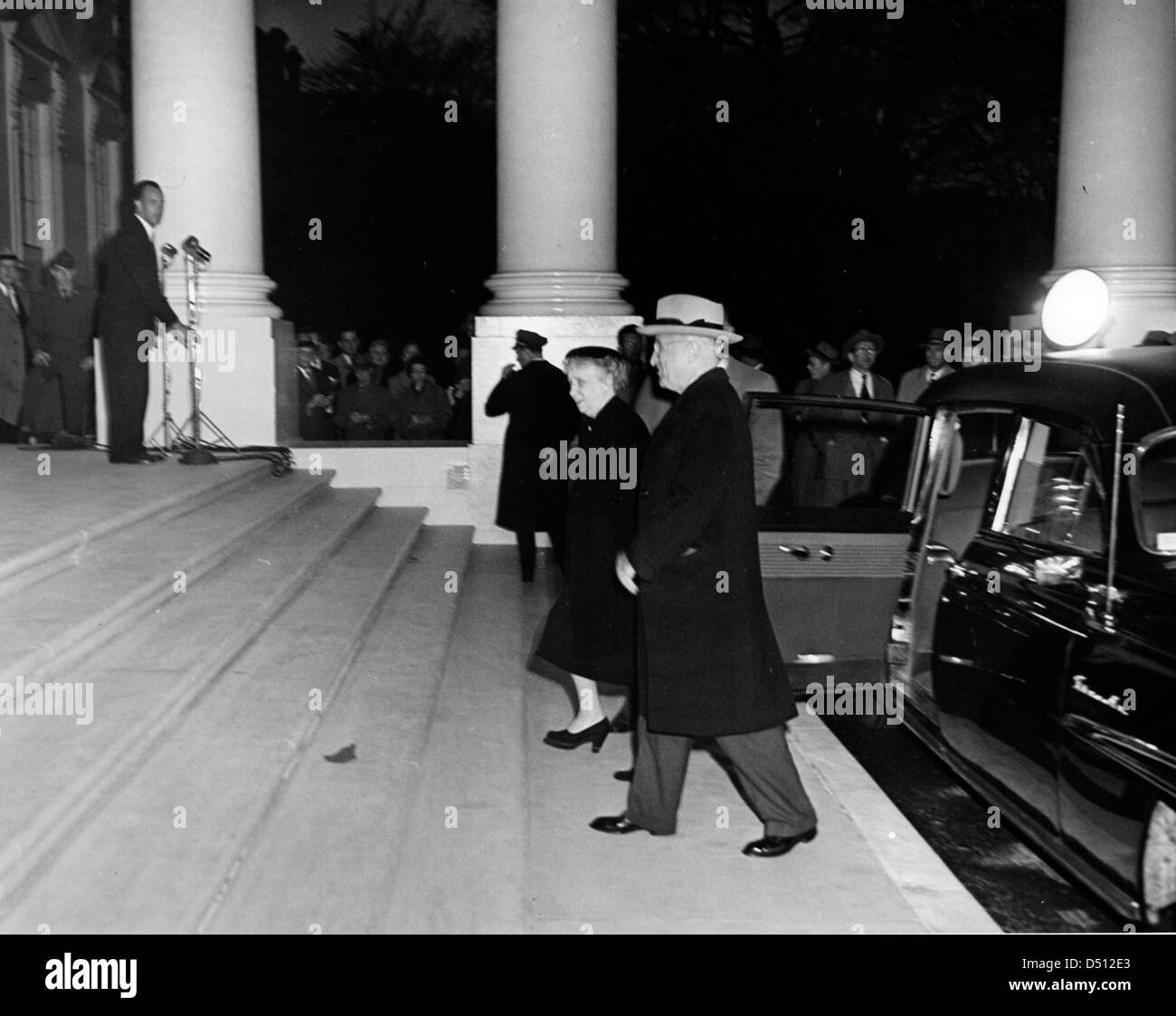 President Harry S. Truman and First Lady Bess Truman Returning to the White House after the Renovation, 03/27/1952 Stock Photo