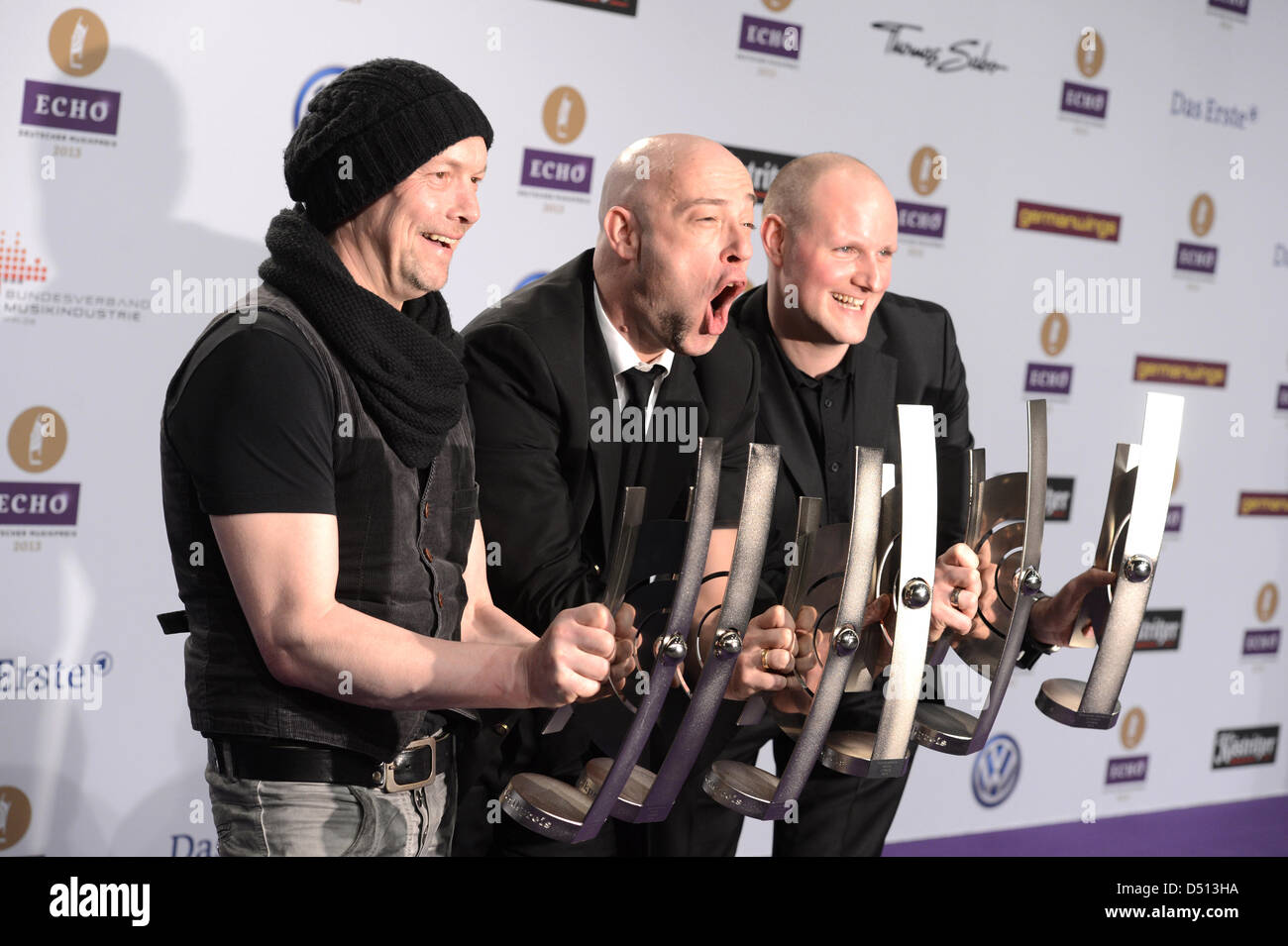 Unheilig pose with the 2013 Echo Music Award in the category 'rock alternative national' in the press room after the Echo Awards ceremony in Berlin, Germany, 21 March 2013. Photo: Jens Kalaene/dpa +++(c) dpa - Bildfunk+++ Stock Photo