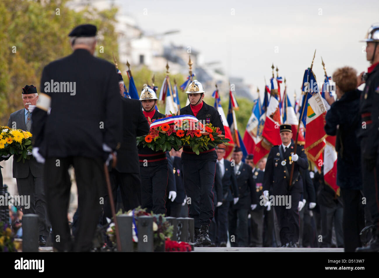 Parade of the Paris Fire Brigade - French Brigade des Sapeurs-Pompiers de Paris on Champs-Élysées and at Arc de Triomphe; Stock Photo