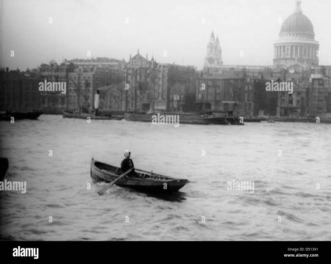 Man in rowing boat Black and White Stock Photos & Images - Alamy