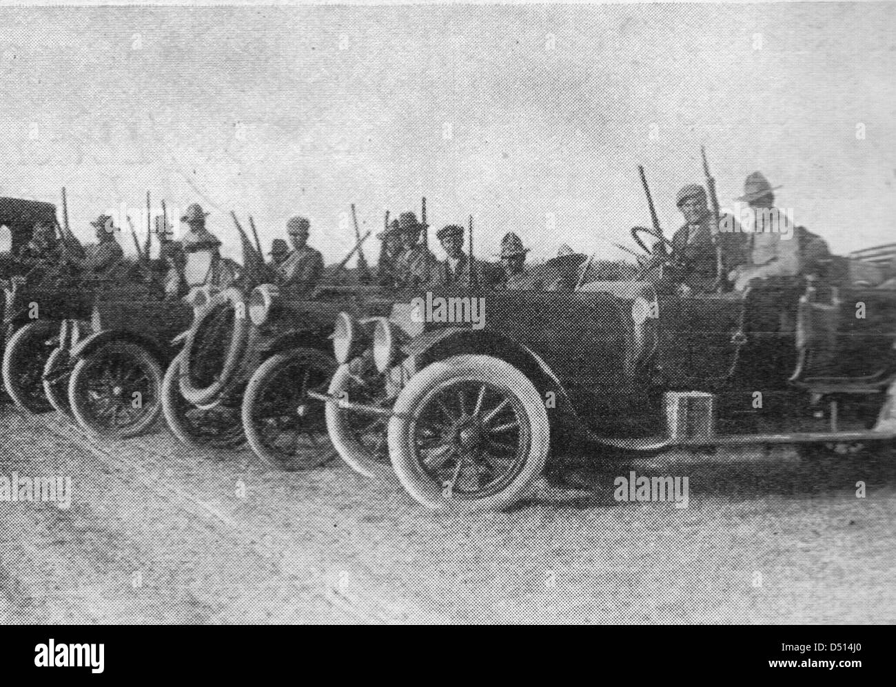 Automobiles loaded with 33000 rounds of ammunition delivering to the Mexican rebels, circa 1917 Stock Photo