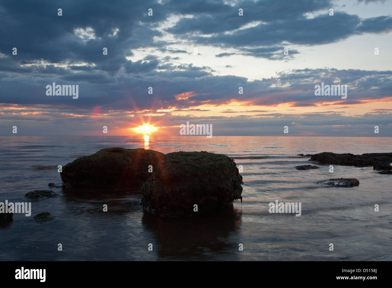 UK; ENGLAND; NORFOLK; HUNSTANTON; SUNSET; ROCKS; LANDSCAPE; SCENIC; BEAUTIFUL Stock Photo