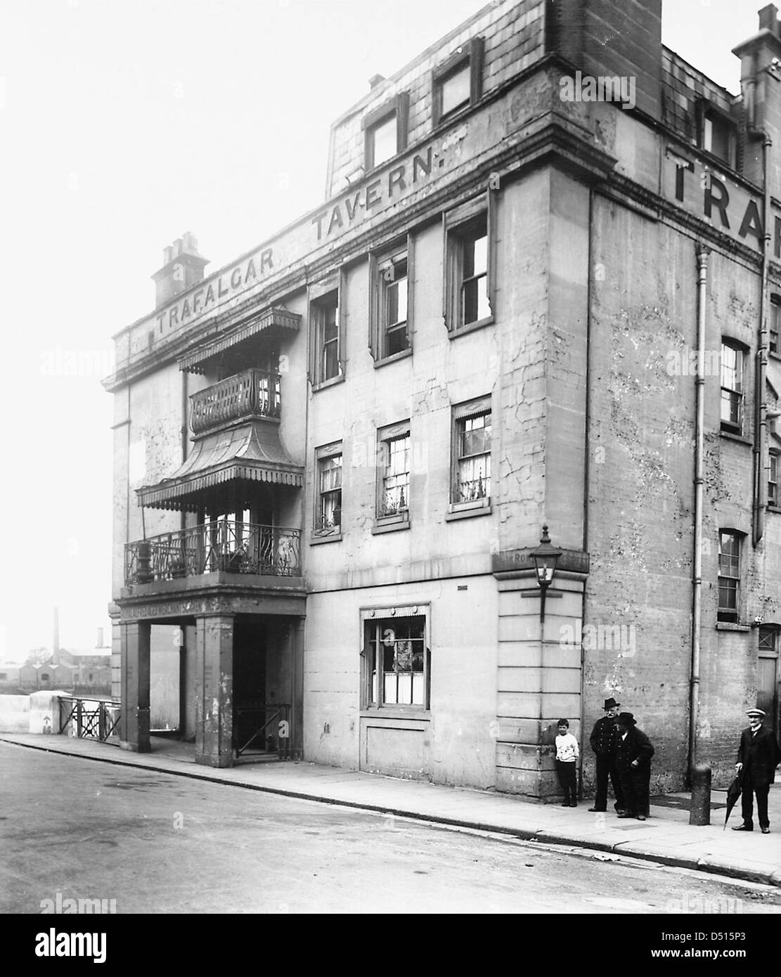 The Trafalgar Tavern, located in Greenwich, is a historical pub known for its maritime connections and its location near the River Thames. It has been a significant site for sailors and travelers in London's history. Stock Photo