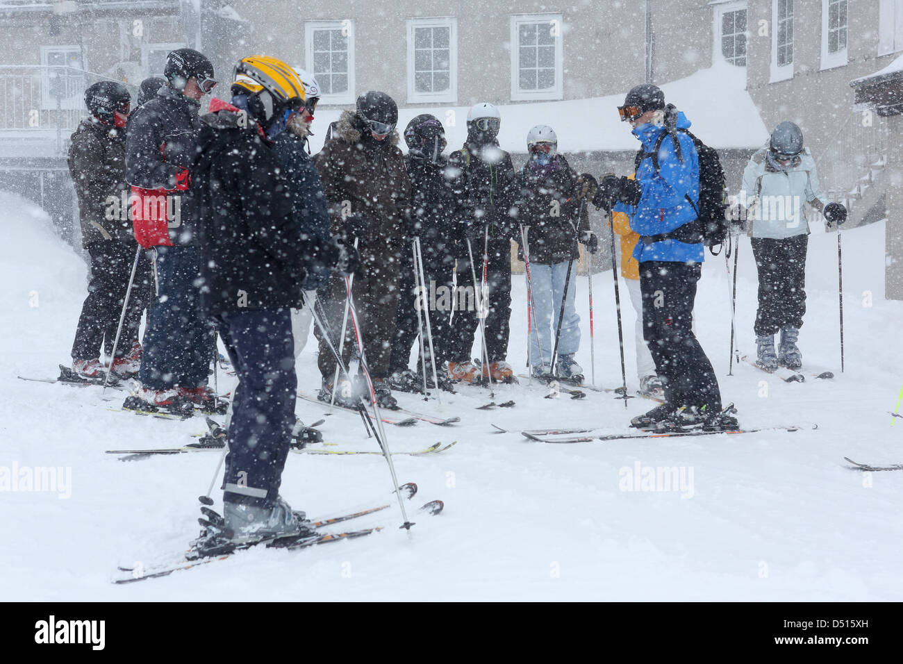 Krippenbrunn, Austria, participants stand in a ski when it is snowing outside a hotel Stock Photo