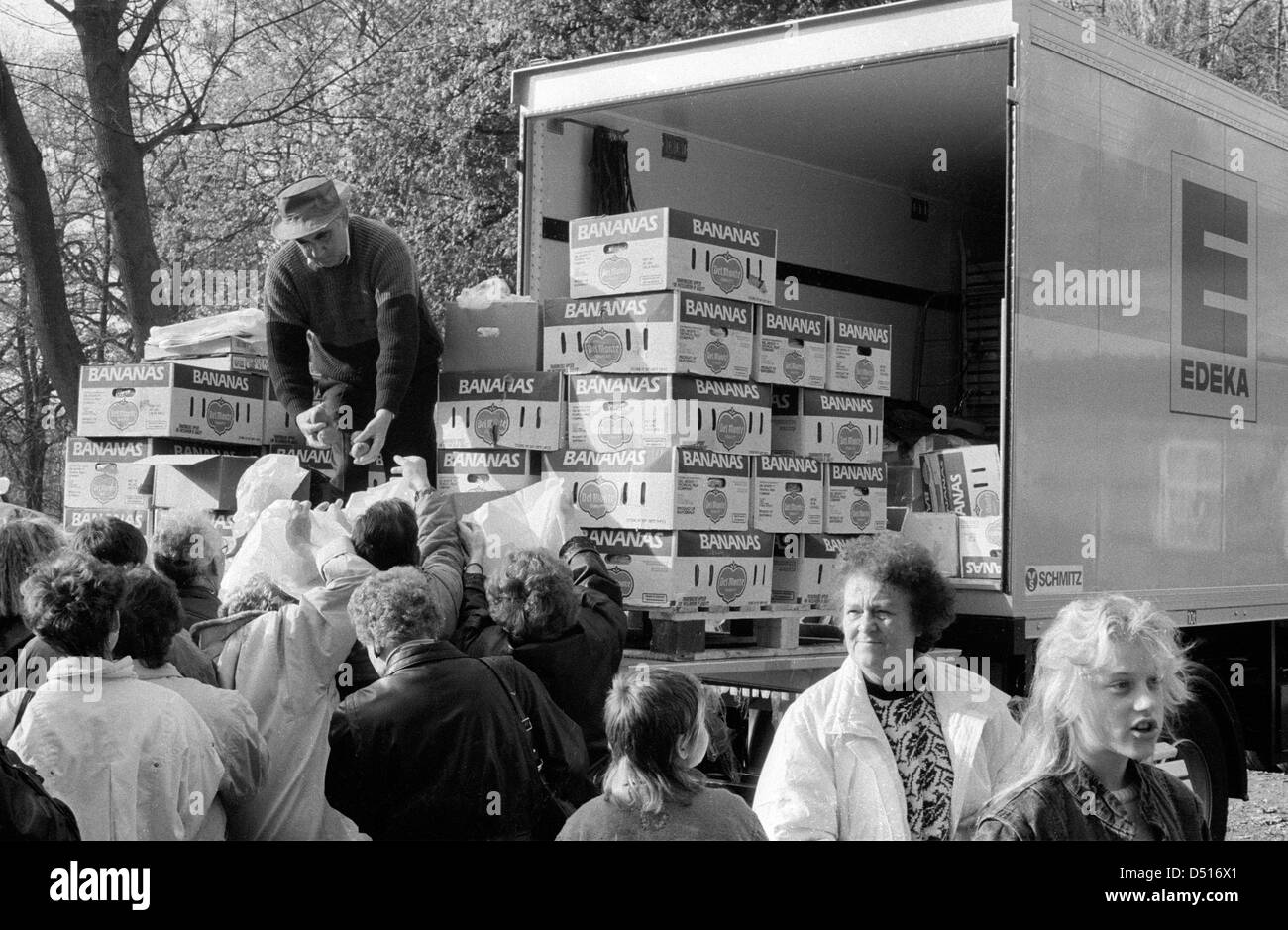 Hoppegarten, Germany, employees of Edeka distributed free banana Stock Photo