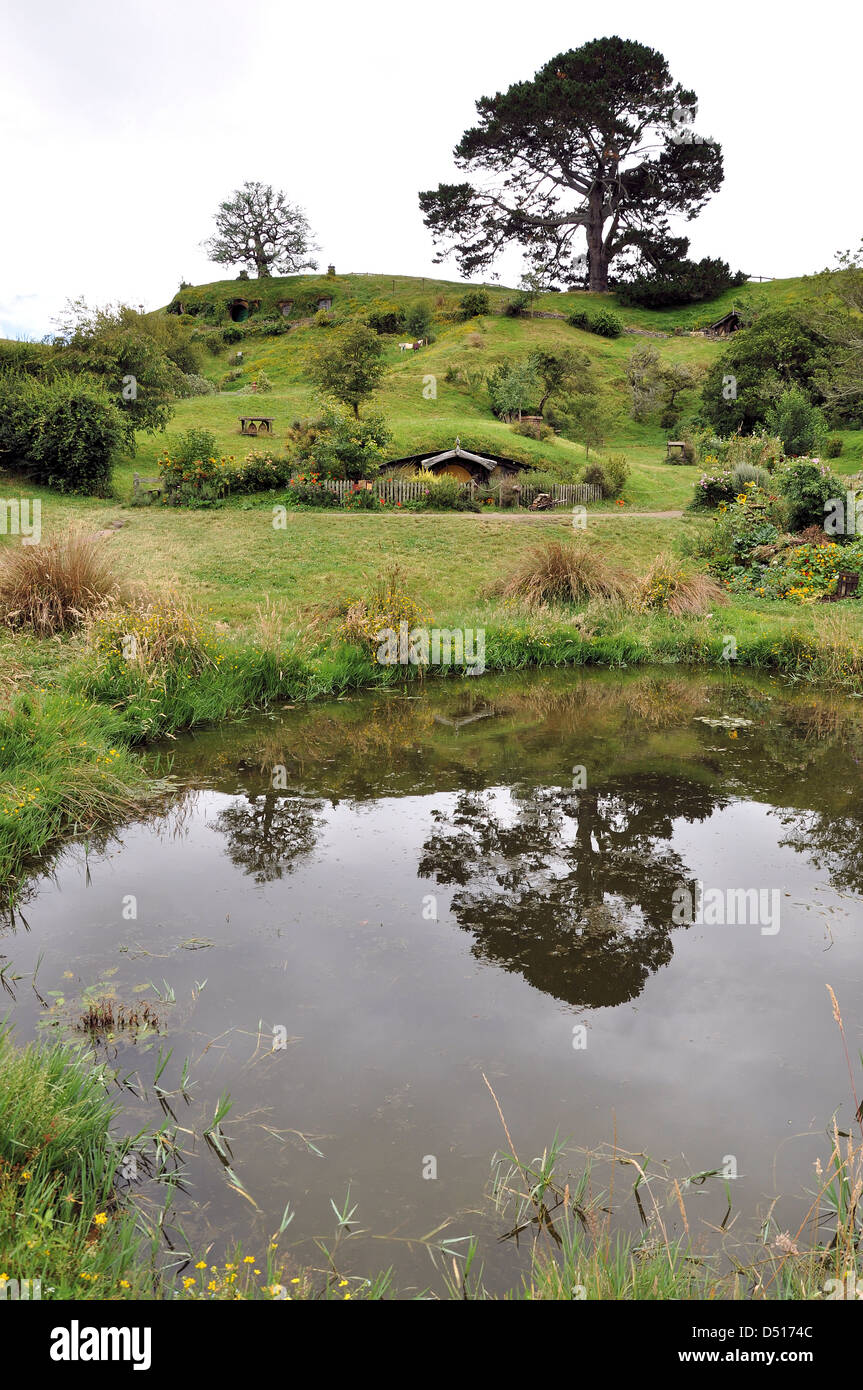 Hobbiton Movie Set - Location for the Lord of the Rings and The Hobbit films. The Shire rolling hills with Hobbit Hole doors Stock Photo