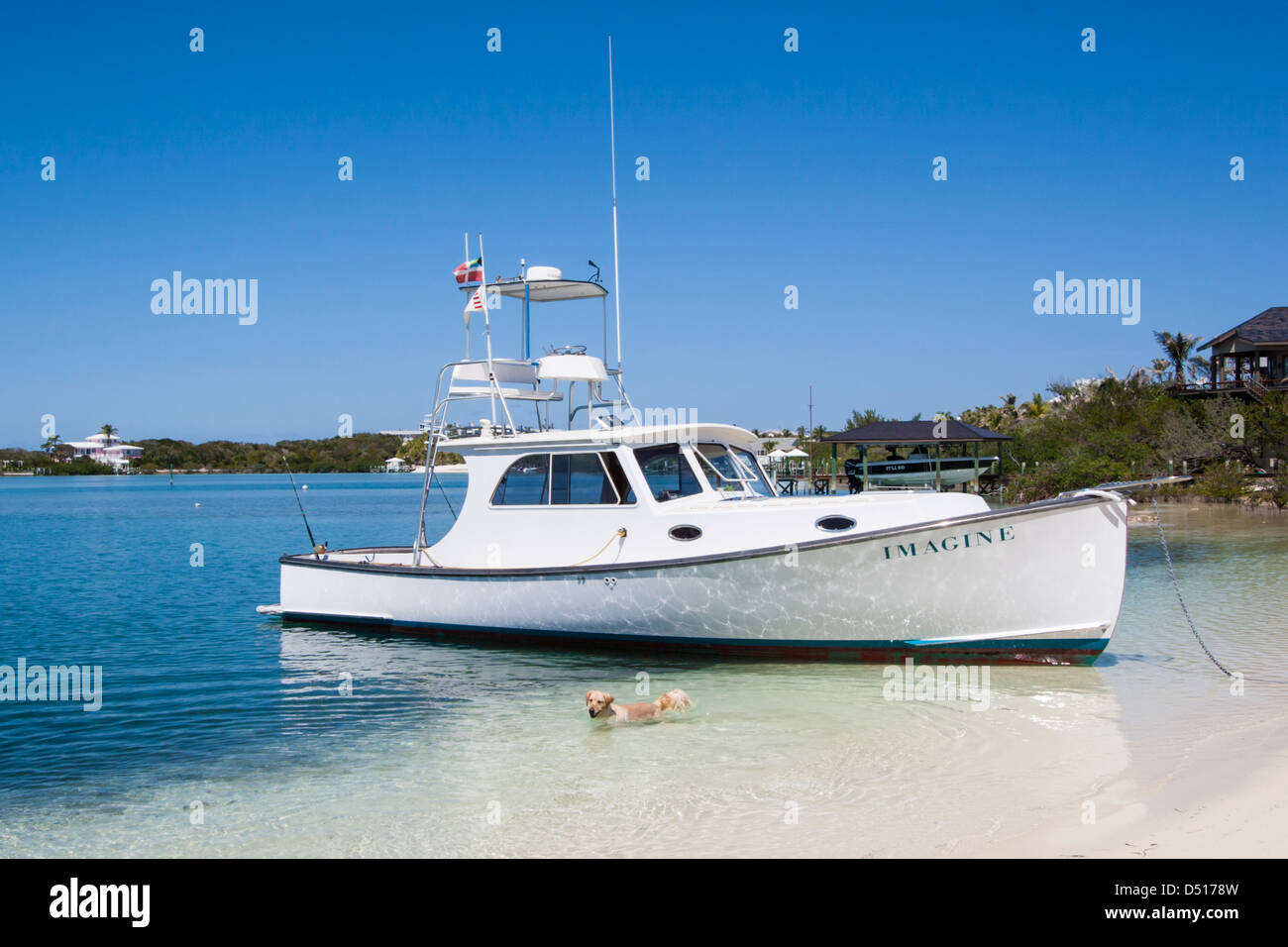 A boat run up ashore on the beach at Elbow Cay, Bahamas Stock Photo Alamy