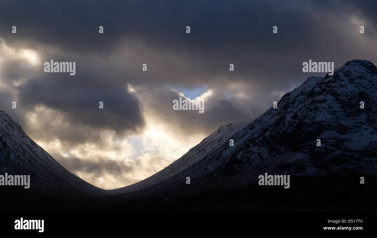 Dramatic sky and a mountain pass, glencoe Scotland Stock Photo