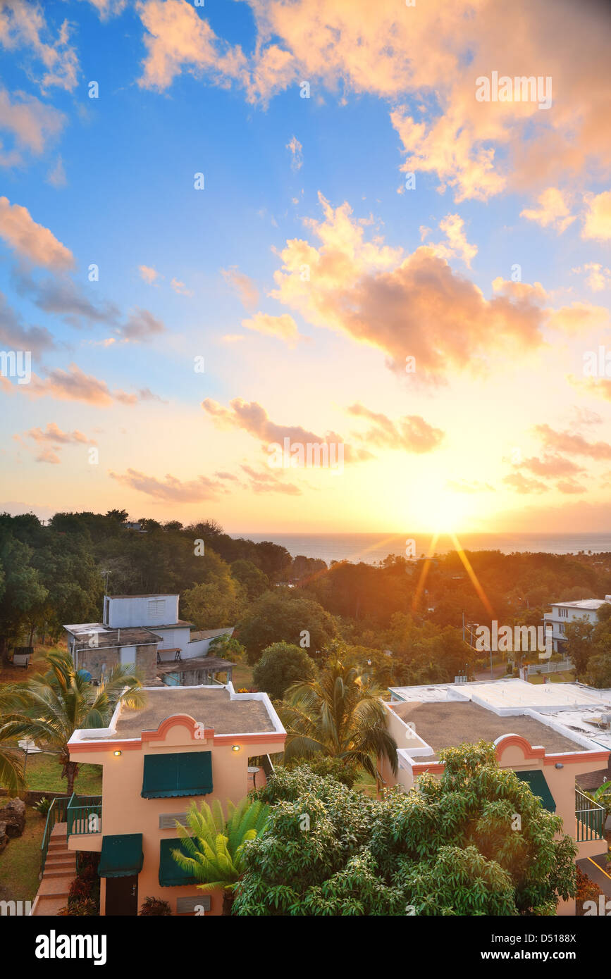 San Juan sunrise with colorful cloud, buildings and beach coastline. Stock Photo