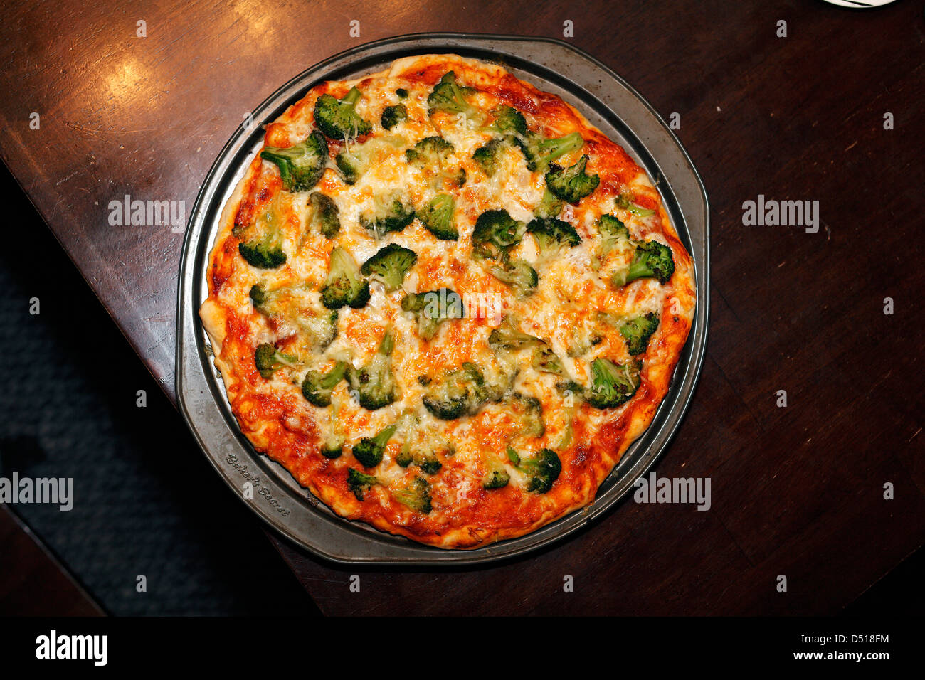 Broccoli and cheese pizza. Stock Photo
