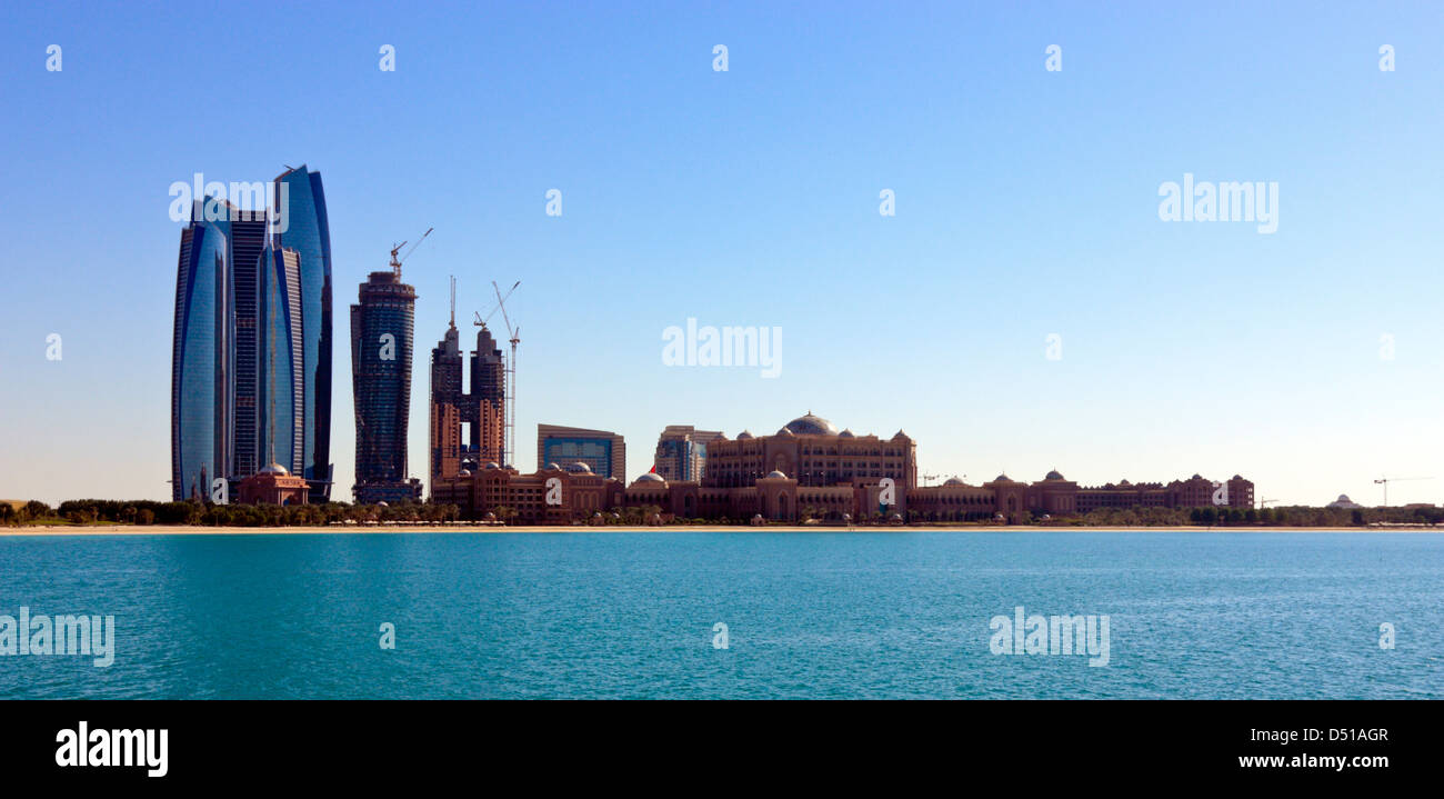 The Etihad Towers and Emirates Palace Hotel in Abu Dhabi, United Arab Emirates Stock Photo
