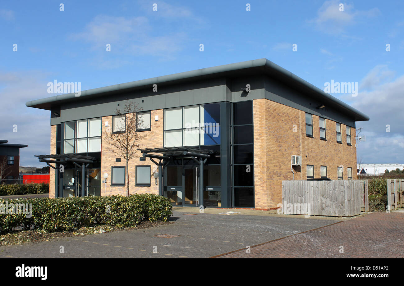 Exterior of empty modern office building in business park. Stock Photo