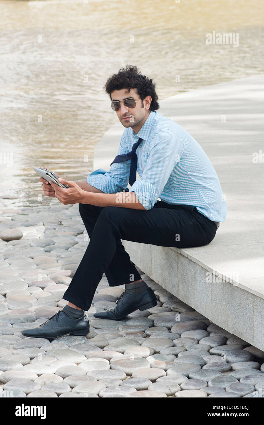 Indian sad man sitting in garden hi-res stock photography and images ...