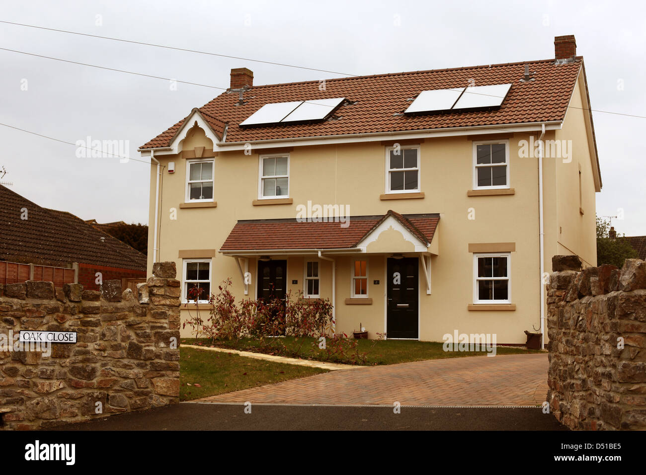 Newly build modern English homes with solar panel on the roof, these homes were built in 2012. Stock Photo
