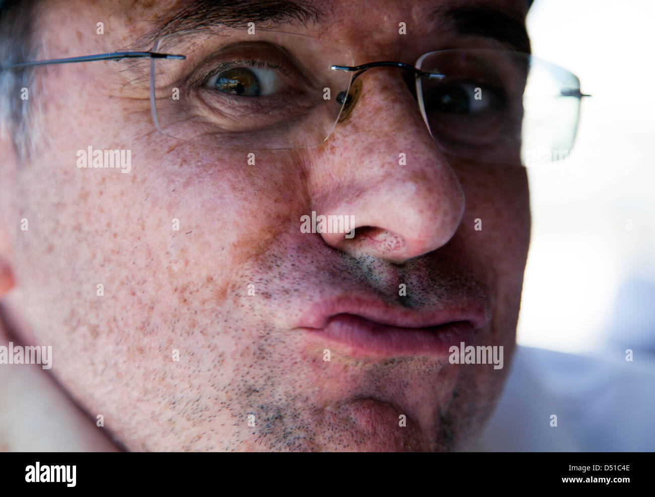 Man Puckering Lips Stock Photo