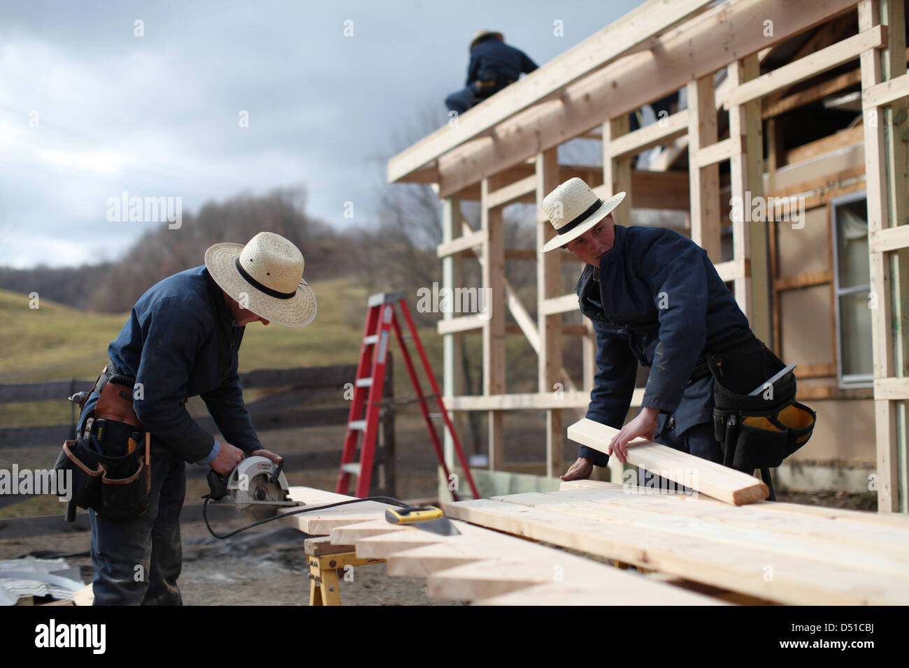 Dec 05, 2012 Bergholz, Ohio, U.S. Men work on an addition to the barn at the Mullet