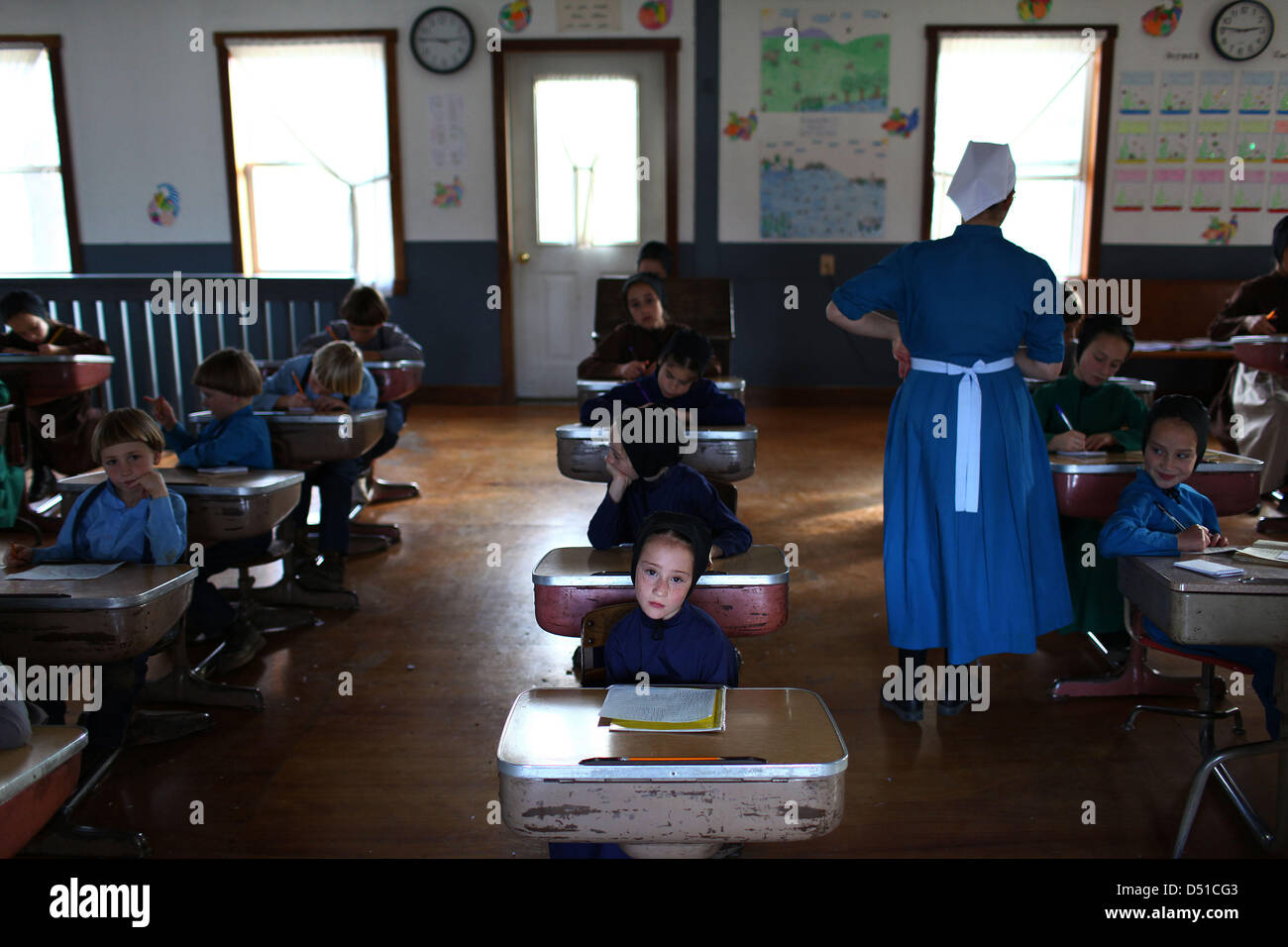 Dec 05, 2012 - Bergholz, Ohio, U.S. - (C) A young amish girls waits for her teacher to come by and check her work during school outside Bergholz, Ohio. (Credit Image: © Michael Francis McElroy/ZUMAPRESS.com) Stock Photo