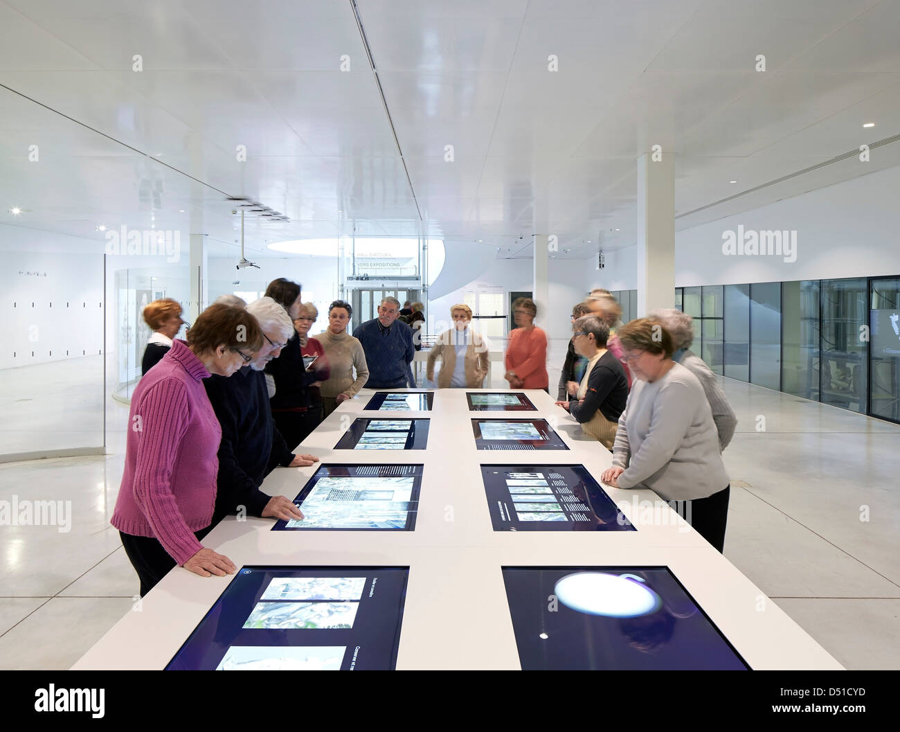 Musée Du Louvre  Lens, Lens, France. Architect: SANAA, 2012. Visitors and interactive display panels. Stock Photo