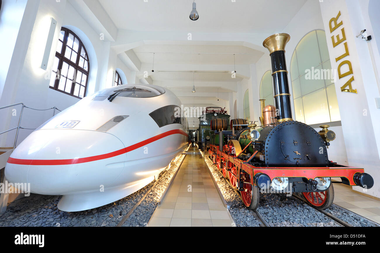 (file)  - A dpa file picture dated 05 March 2010 shows a reproduction of an historical 'Adler' locomotove (R) next to a model of a ICE high speed train at the Deutsche Bahn (DB) Museum in Nuremberg, Germany. On 07 December 1835, the first German steam locomotiove made its way from Nuremberg to Fuerth. On 07 December 2010, the city of Nuremberg celebrates the 175-year-anniversary of Stock Photo