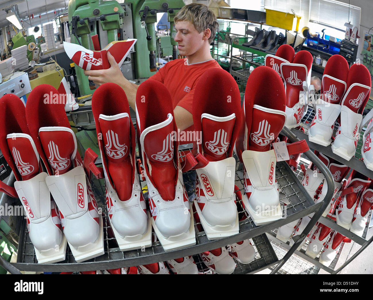 Steve Rass checks ski jumping boots at the workshop of the company Rass  Special Sport Shoes manufacturers in Schoenheide, Germany, 3 December 2010.  The small company from the Erz Mountains employs about