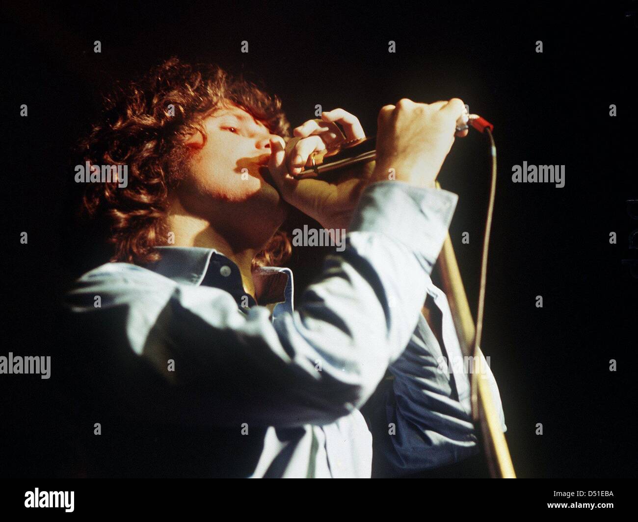 An undated file picture shows 'The Doors' singer Jim Morrison during a concert. Jim Morrison is supposed to be pardoned from the accusal of having denuded in public during a concert, by the parting gouvenor of Florida, Crist. Morrison, who died in July 1971, was sentenced to a 500 Dollar fee and six months in custody. The case will be decided on on Tuesday 7 December 2010. Photo: d Stock Photo