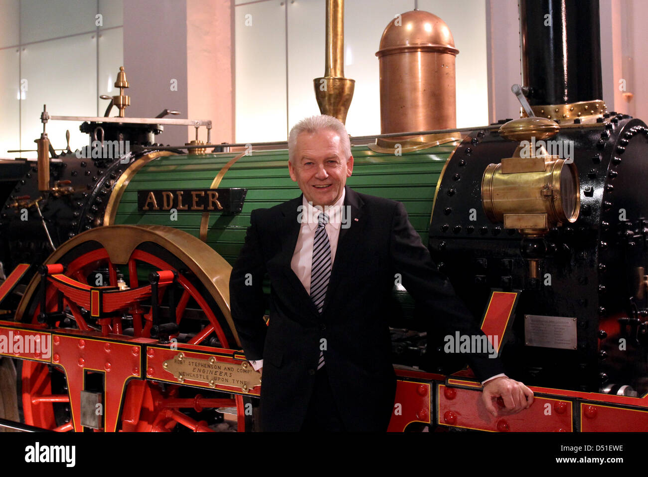 Der Vorstandsvorsitzende der Deutschen Bahn, Rüdiger Grube, steht am Dienstag (07.12.2010) in Nürnberg (Mittelfranken) am Rande des Festakts zum 175. Jubiläum der Eisenbahn neben einem Nachbau des 'Adlers'. Mit einem großen Festakt feiert die Stadt Nürnberg mit der Deutschen Bahn das Jubiläum der ersten Eisenbahnfahrt. Am 7. Dezember 1835 dampfte zum ersten Mal der 'Adler' von Nürn Stock Photo