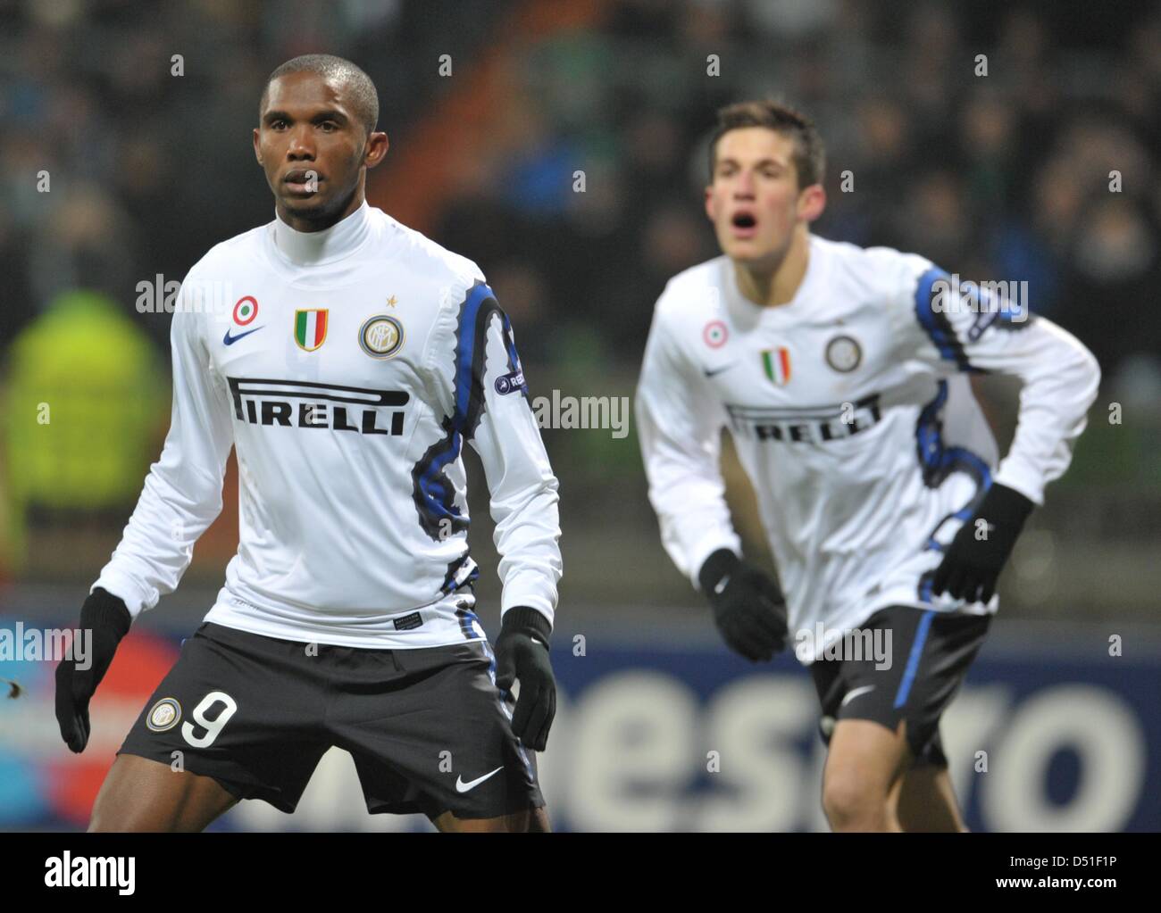 Milano's Samuel Eto'o (L) and Cristiano Biraghi follow the course of the ball during UEFA Champions League group A match Werder Bremen vs. FC Internazionale Milano at the Weserstadium in Bremen, Germany, 07 December 2010. Bremen won the match 3-0. Photo: Carmen Jaspersen Stock Photo