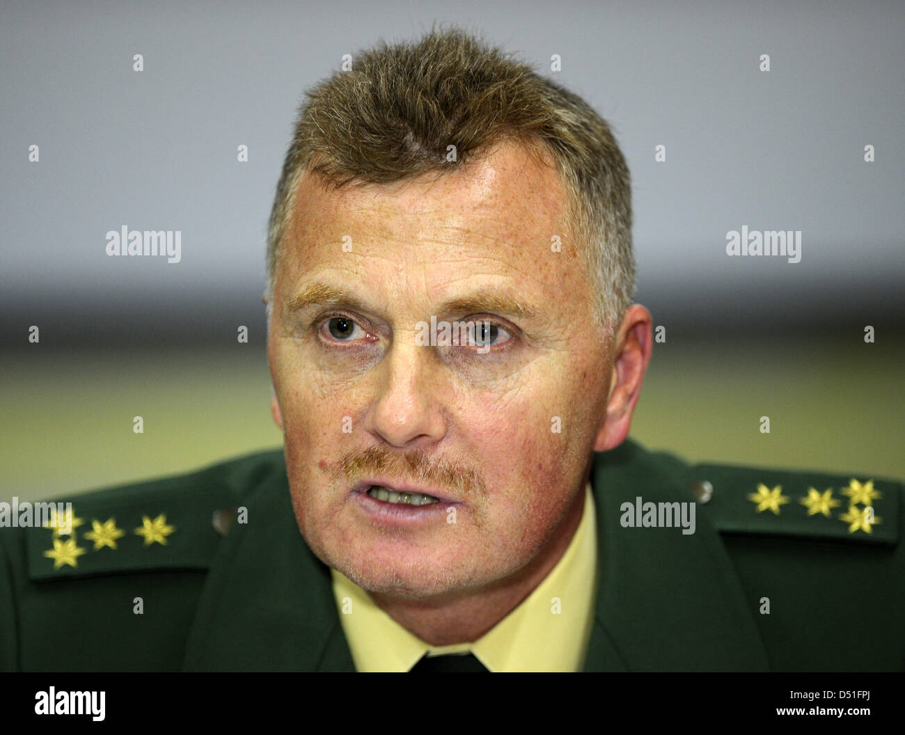 Marshal Roland Lay speaks during a press conference in Karlsruhe, Germany, 10 December 2010. In the course of a bank hold-up on a highly frequented shopping street, the police shot the two bank robbers, a man and a woman, dead. A female police officer was severely injured during the operation. The two robbers are held to be the long searched-for 'Gentlemen Robbers'. In the course o Stock Photo