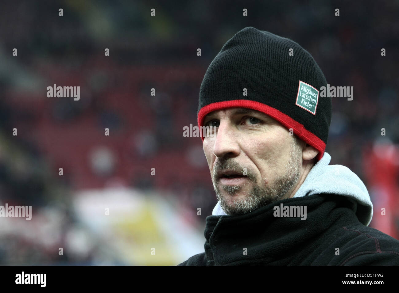 Lautern's coach Marco Kurz gives an interview before kickoff during a German Bundesliga match of 1. FC Kaiserslautern versus VfL Wolfsburg in Kaiserslautern, Germany, 11 December 2010. Photo: Fredrik von Erichsen    (ATTENTION: EMBARGO CONDITIONS! The DFL permits the further utilisation of the pictures in IPTV, mobile services and other new technologies only no earlier than two hou Stock Photo