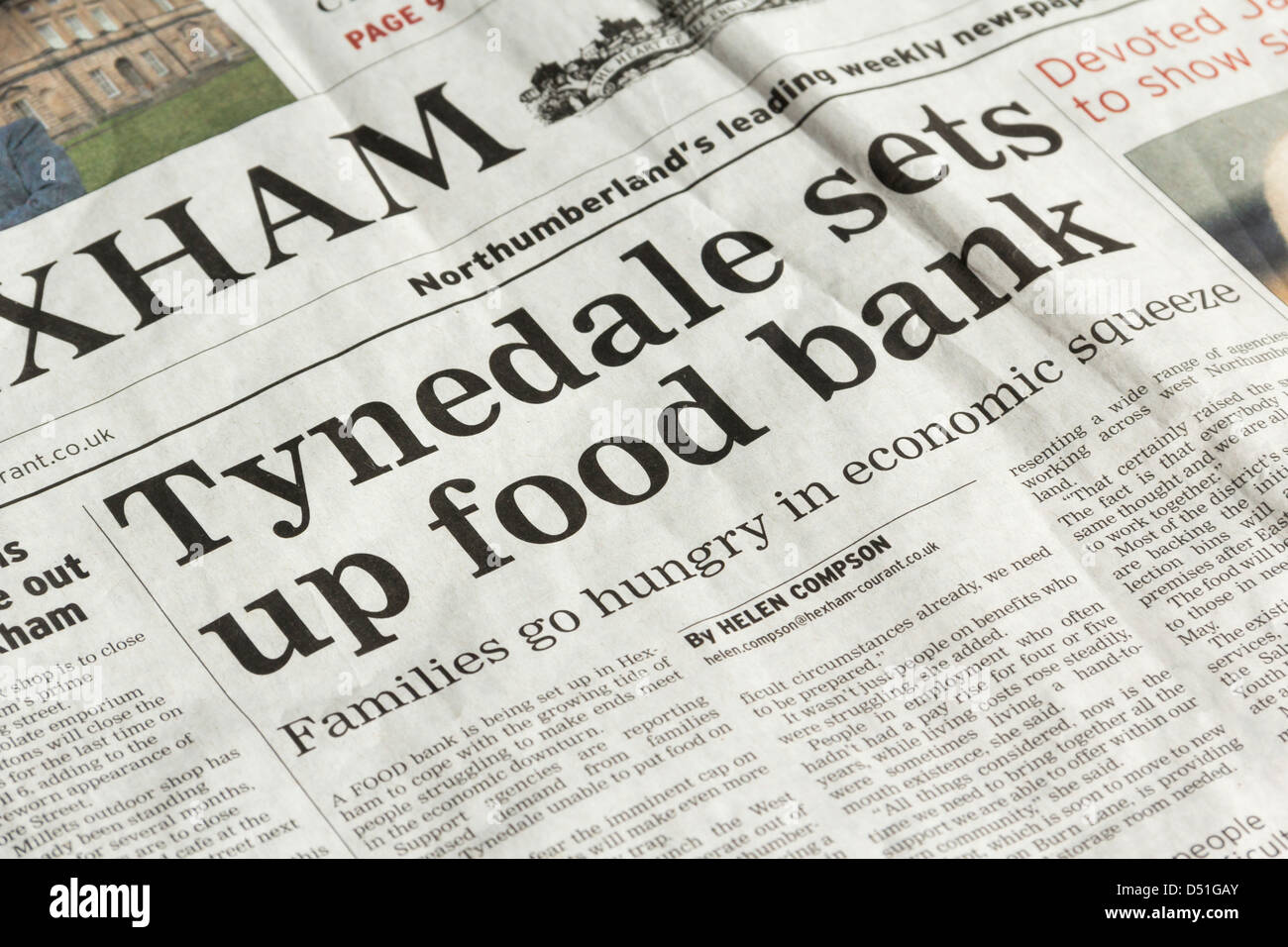 Headline on the setting up of a  food bank in Tynedale, Northumberland on the front page of the Hexham Courant newspaper. Stock Photo