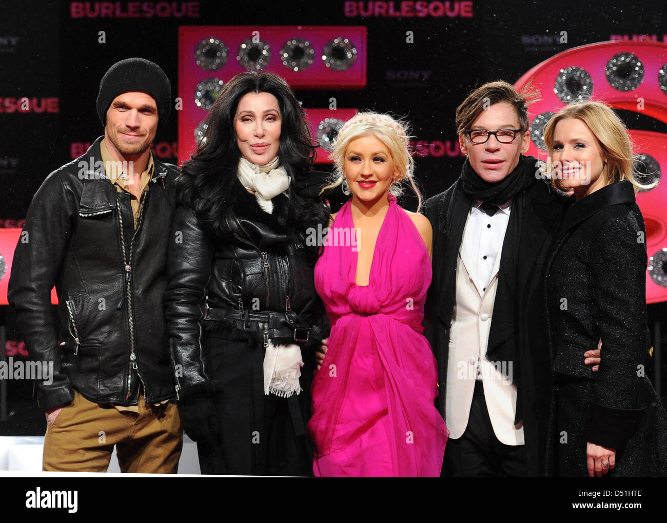 (L-R) US actress Kristen Bell, US singer and actress Cher, US singer and actress Christina Aguilera and US director Steve Antin attend the Germany premiere of the film 'Burlesque' in Berlin, Germany, 16 December, 2010. 'Burlesque' is in German cinemas from 06 January 2011 on. Photo: Jens Kalaene Stock Photo