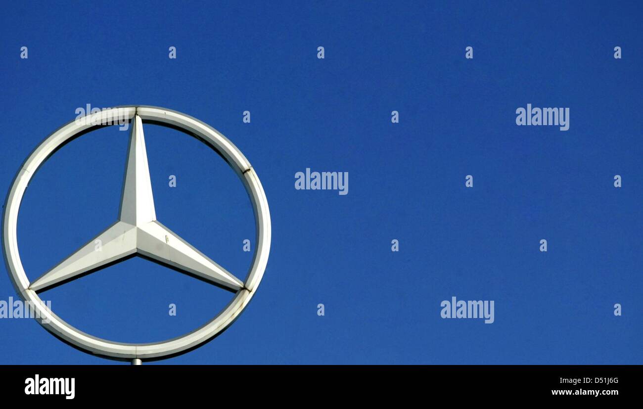 (file) - A dpa file picture dated 15 December 2009 shows the Mercedes logo in Magdeburg, Germany. Daimler aims to break 2008's record by producing more than 1.2 milllion cars by the end ot 2010. Photo: Jens Wolf Stock Photo