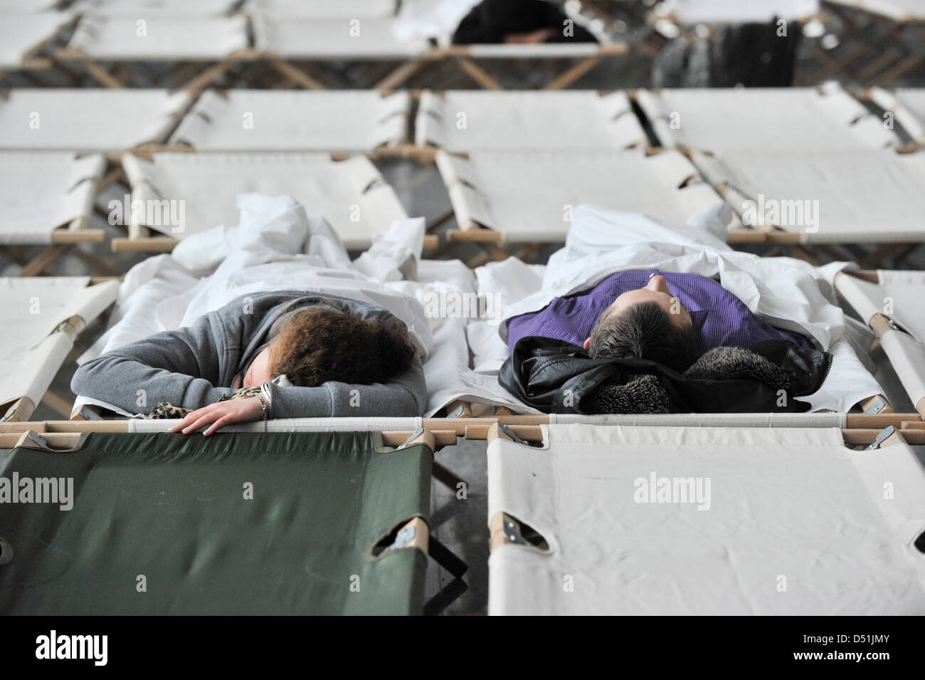 Passengers sleep airport in frankfurt hires stock photography and
