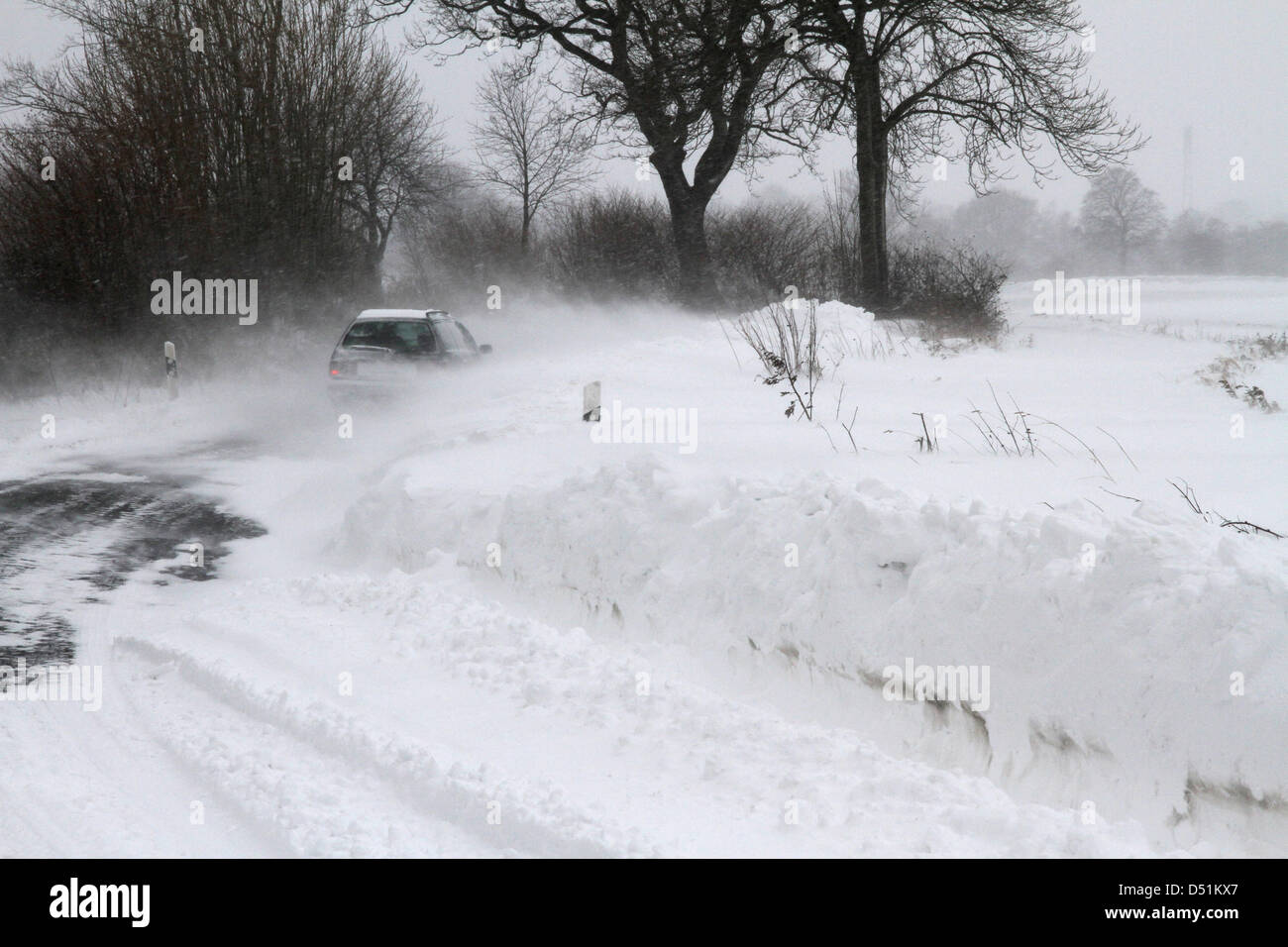 Snow drifts impair road traffic in Waab, Germany, 23 December 2010. Photo: DANIEL FRIEDRICHS Stock Photo