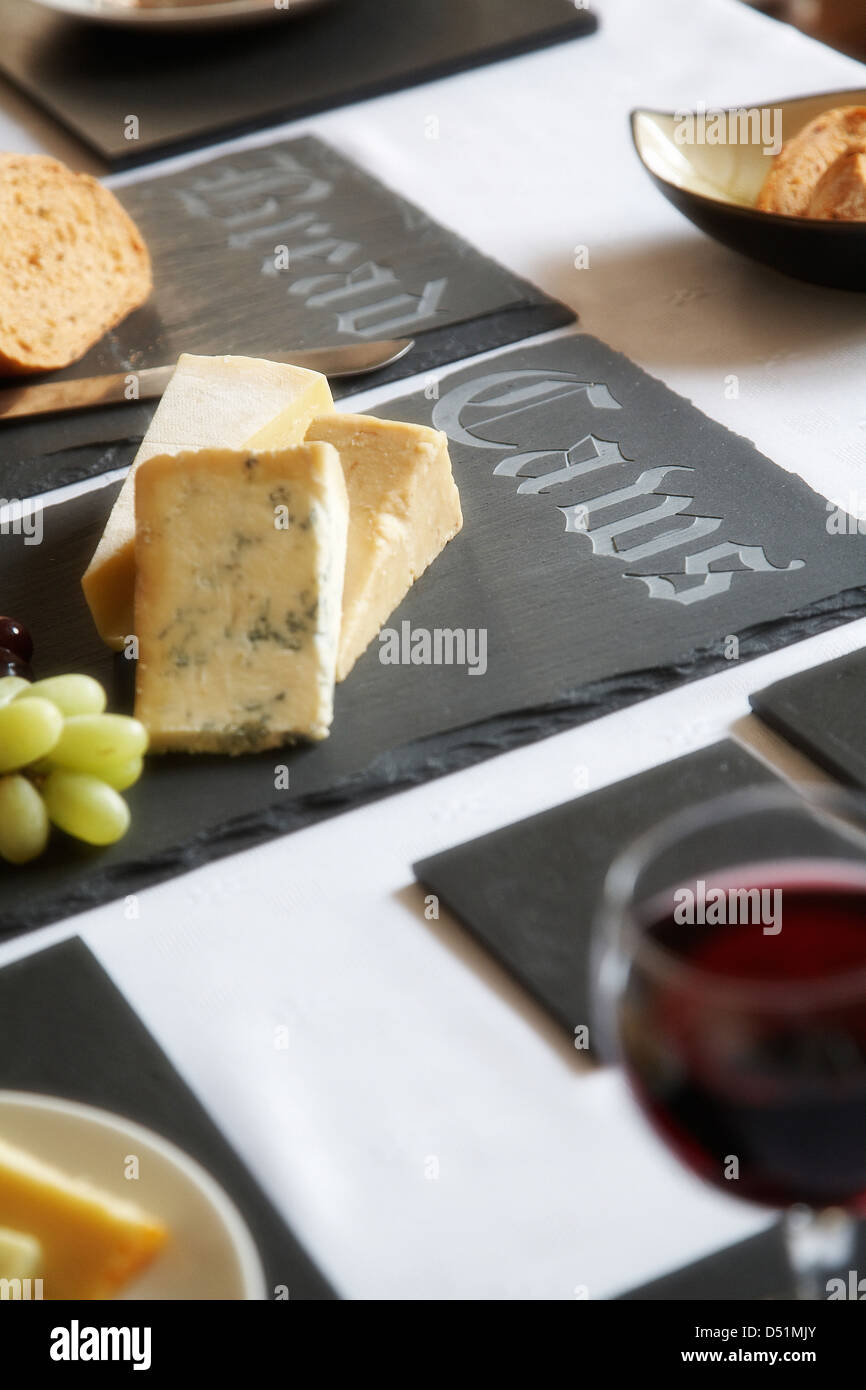 A Table Setting With Bread Mixed Cheeses Olives Laid Out On Black Welsh Slate Boards And Placemats Wales Uk Stock Photo Alamy A Table Setting With Bread Mixed Cheeses Olives Laid Out On Black Welsh Slate Boards And Placemats Wales Uk Stock Photo Alamy