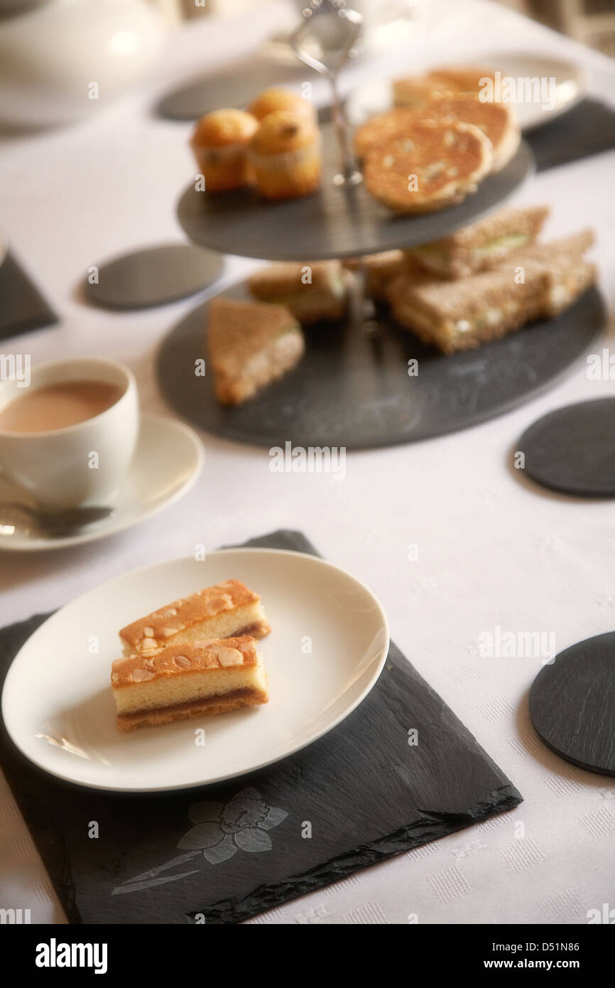 Afternoon tea table setting using welsh slate placemats and coasters in
