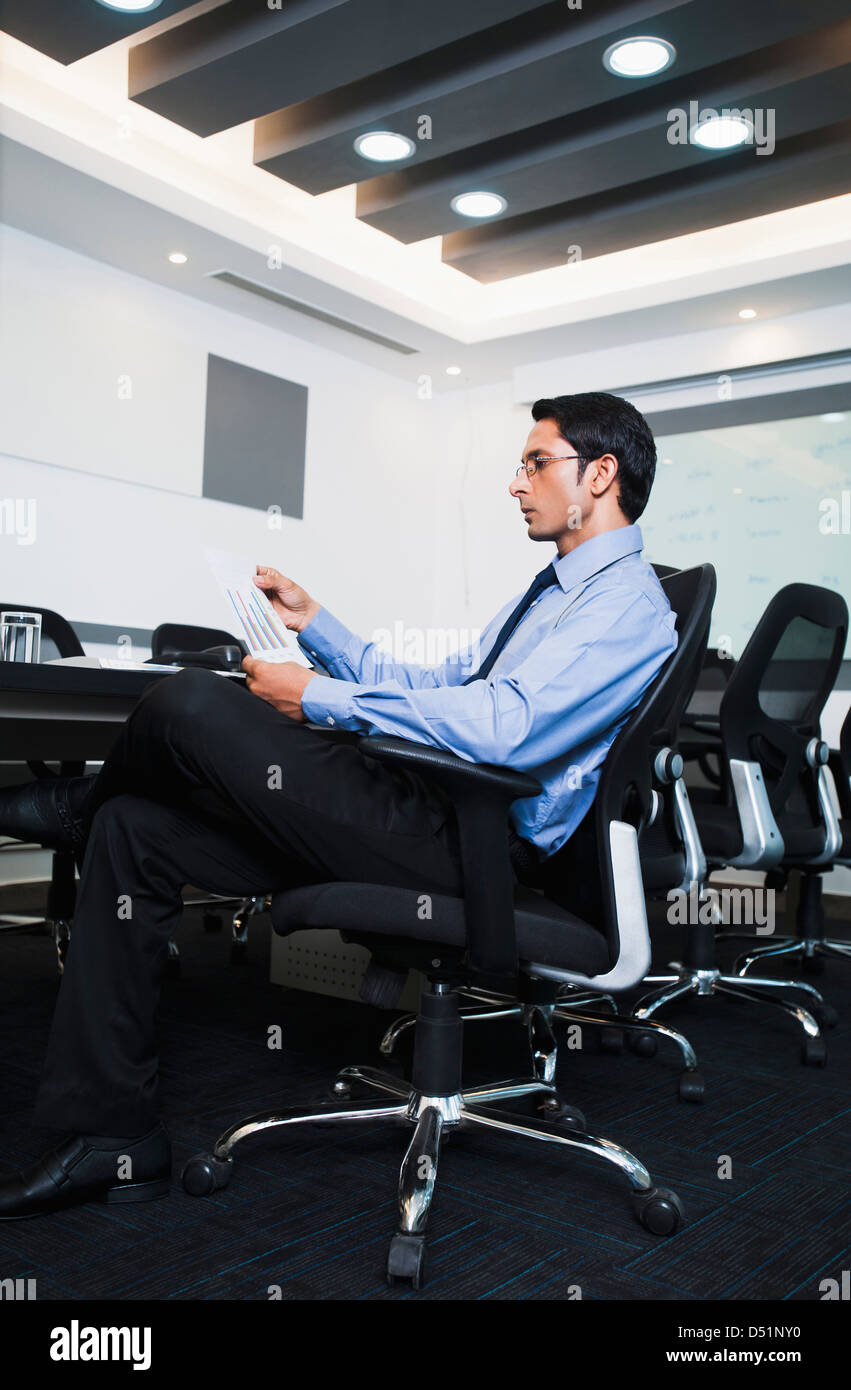 Businessman Reviewing Pie Chart Stock Photo - Alamy