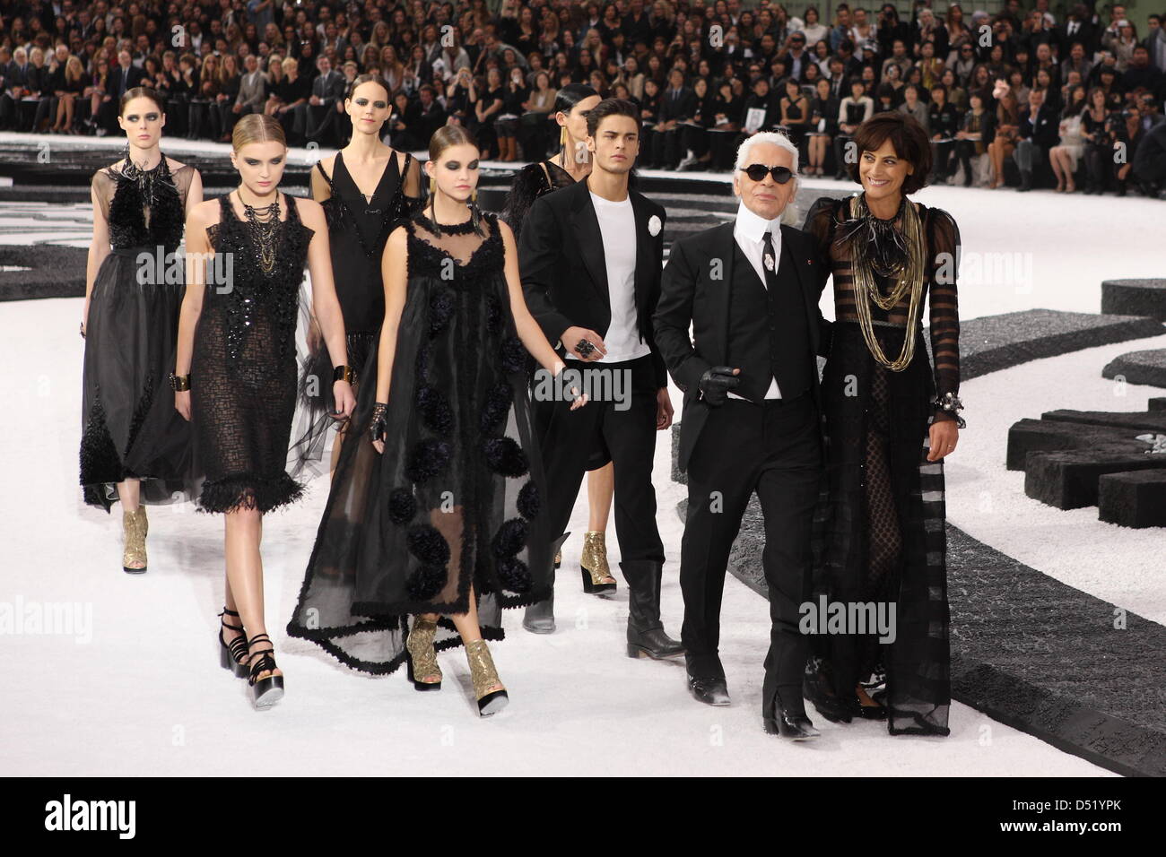 German designer Karl Lagerfeld together with former Chanel supermodel Ines  de la Fressange (R) presents his Spring/Summer 2011 collection for Chanel  during Paris Pret A Porter, in Paris, France, 5 October 2010.