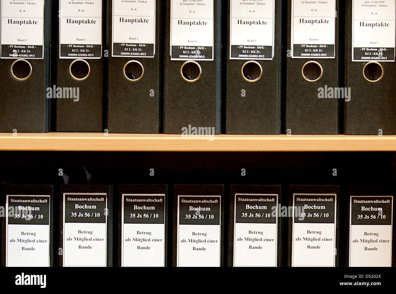 A shelf holding file folders is featured in the court room of the ...