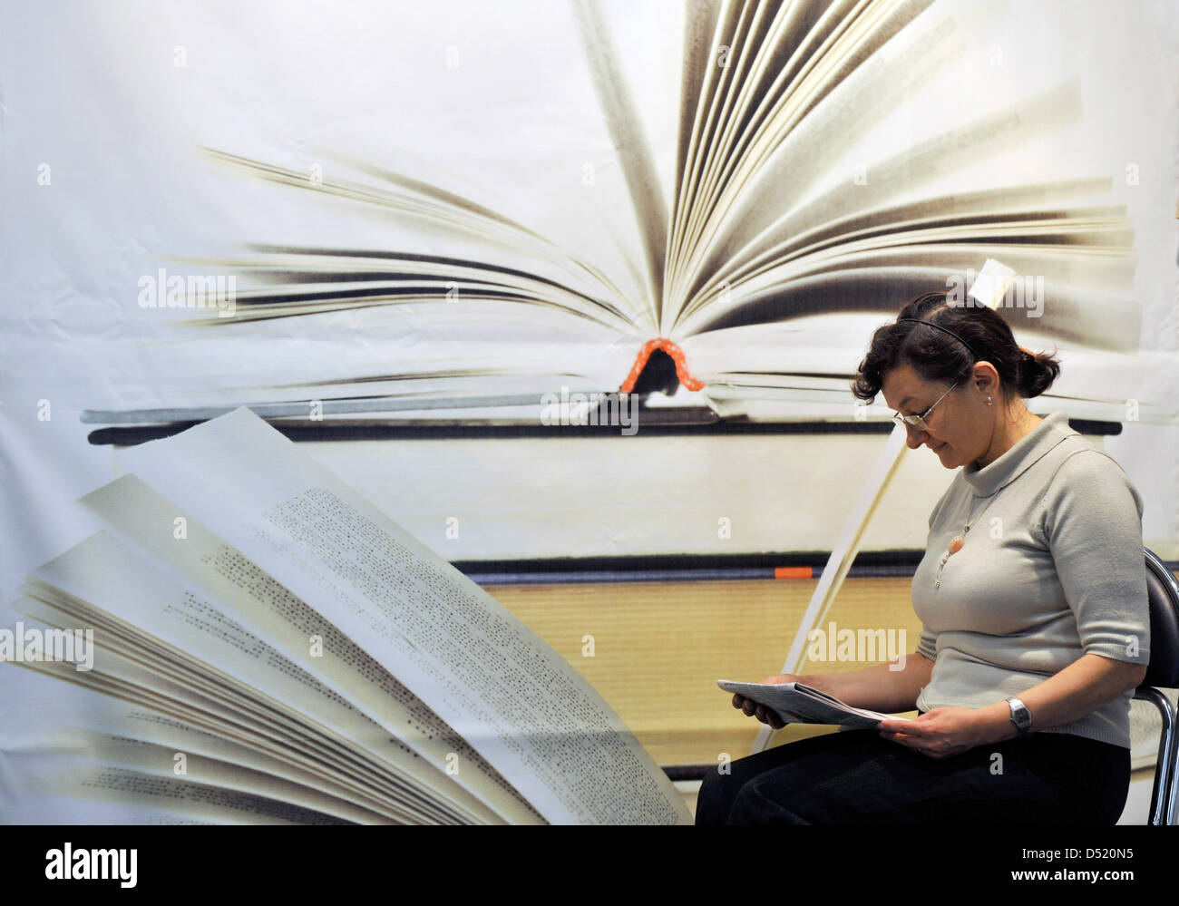A visitor at the Book Fair in Frankfurt Main, Germany, 07 October 2010 ...