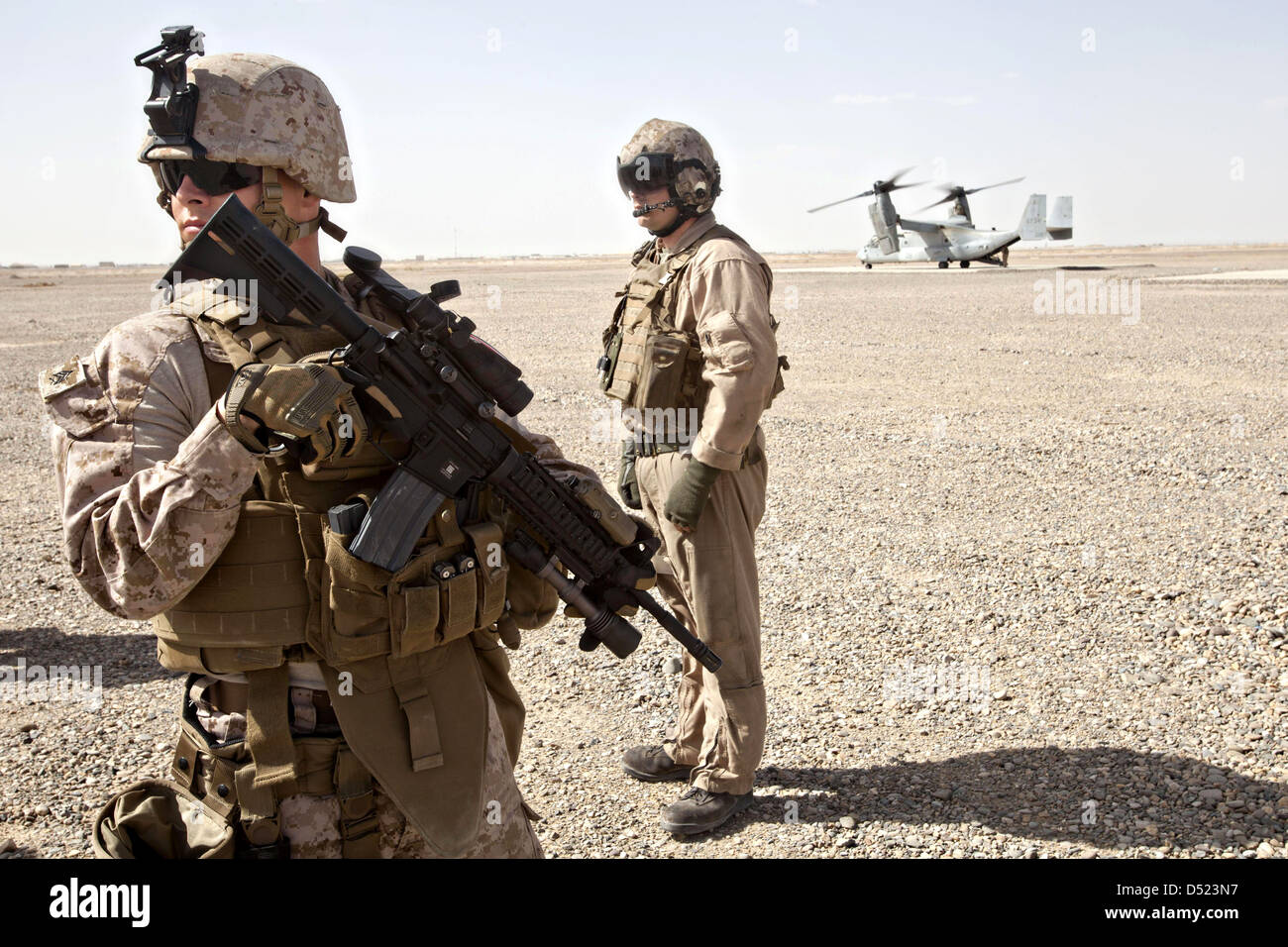 US Marines prepare to board an MV-22 Osprey helicopter March 16, 2013 at Camp Dwyer, Helmand Province, Afghanistan. Stock Photo